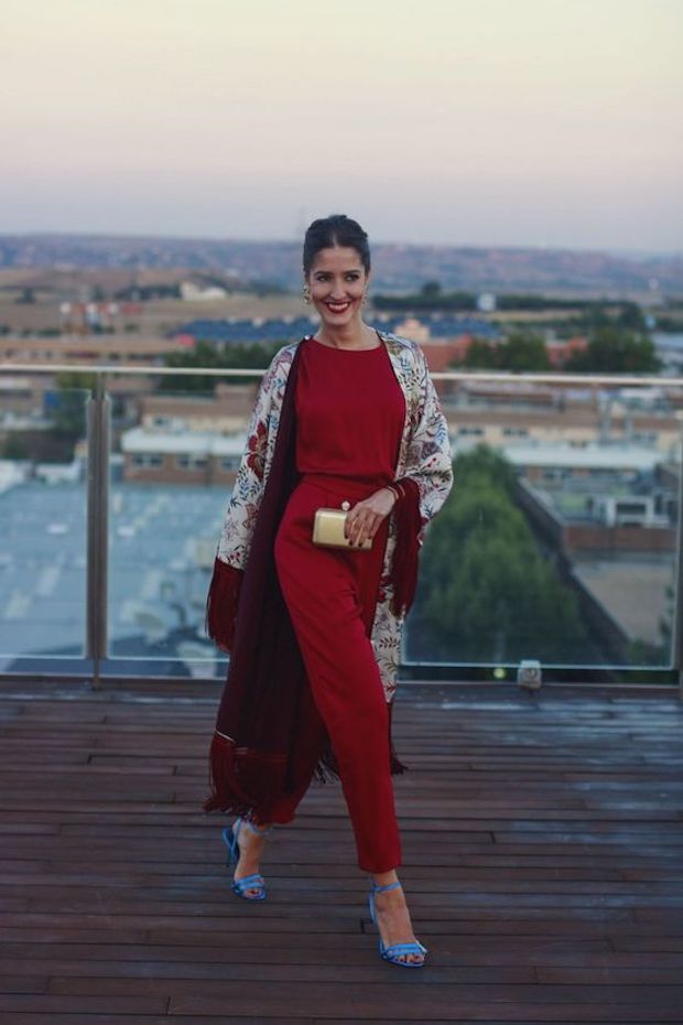 A red jumpsuit with a duster. A great wedding officiant outfit.