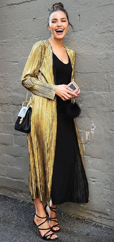 A black dress with a duster. A great officiant outfit.