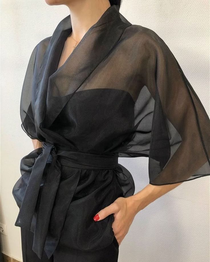A sheer shrug belted at the waist. A great wedding officiant option.